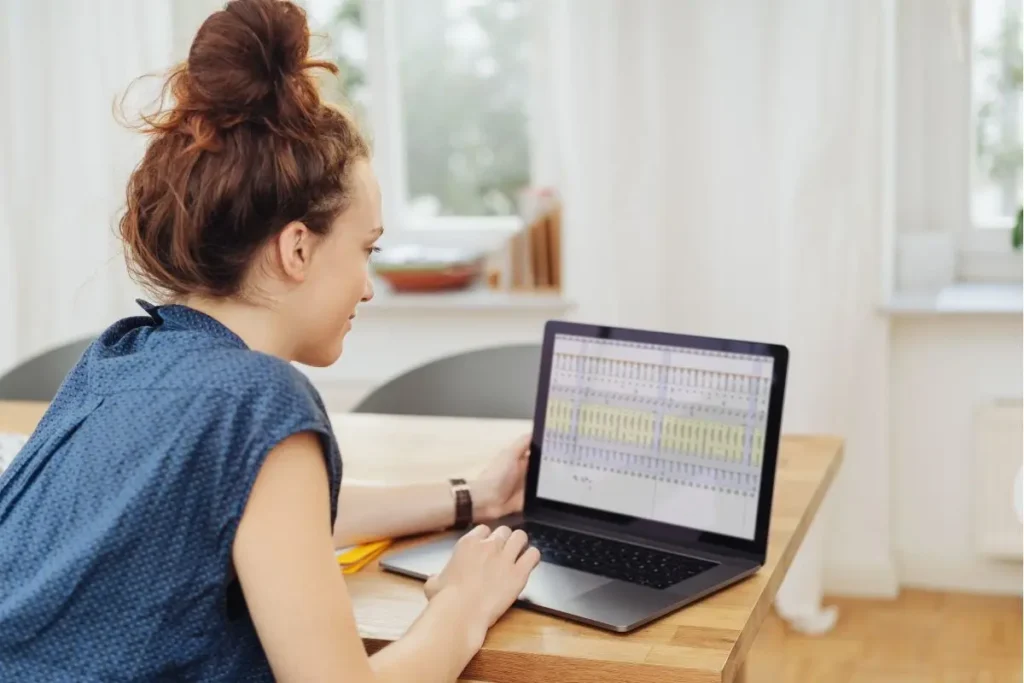 Person working from home typing on a laptop, representing entry level remote data entry jobs for beginners
