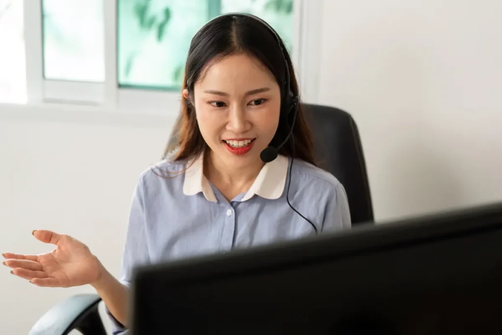 Entry-level live chat agent working from home helping customers online 2025